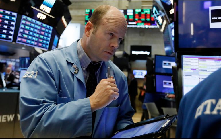 El NYSE Composite sube 29.50 puntos (0.24 por ciento) al ubicarse en 12 mil 411.33 unidades. AP / R. Drew