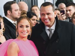 La actriz y cantante, orgullosa de sus raíces. En la foto, al lado de su actual pareja, Alex Rodríguez. AFP