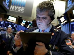 El Dow Jones restó 53.22 puntos, llegó hasta 25 mil 053.11 enteros. AP / R. Drew