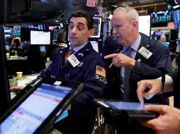 El parqué neoyorquino recibió con optimismo la noticia confirmada que se alcanzó un acuerdo tentativo para evitar un nuevo cierre parcial de la Administración. AP / R. Drew