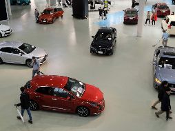 Al año, no pagan arancel 2.6 millones de vehículos vehículos de pasajeros mexicanos exportados a Estados Unidos. AFP/K. Nogi