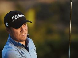 Justin Thomas estará en la cima al reiniciar la tercera ronda.AFP / H. How