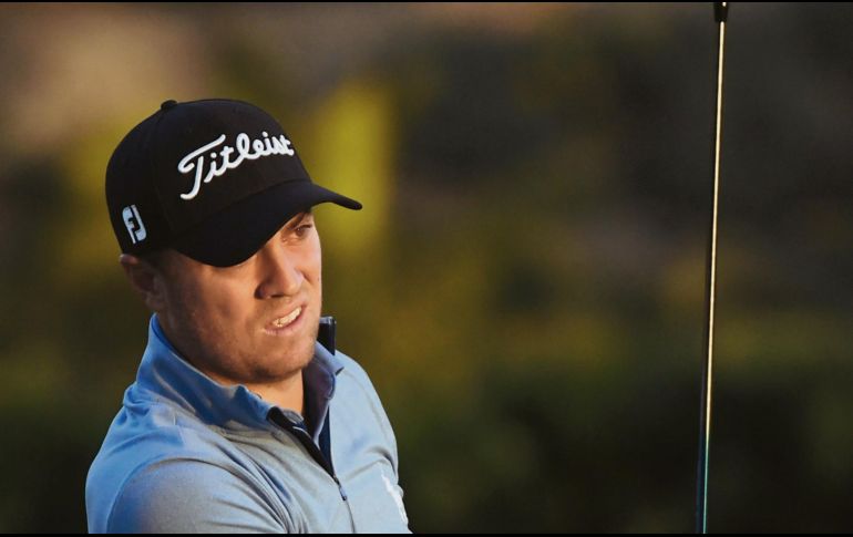 Justin Thomas estará en la cima al reiniciar la tercera ronda.AFP / H. How