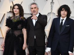 Alfonso Cuarón y sus hijos, Tess Bu Cuarón y Olmo Teodoro Cuarón. AFP / M. Ralston