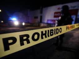 De acuerdo con los testimonios recabados en el lugar, civiles armados dispararon contra el vehículo causando la muerte del hombre y alcanzando también a la oficial de policía. EFE / ARCHIVO