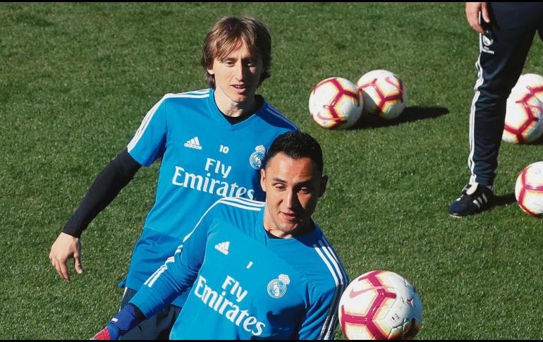 Marcelo, Keylor Navas y Luka Modric, en la práctica de los madridistas. EFE
