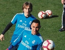 Marcelo, Keylor Navas y Luka Modric, en la práctica de los madridistas. EFE