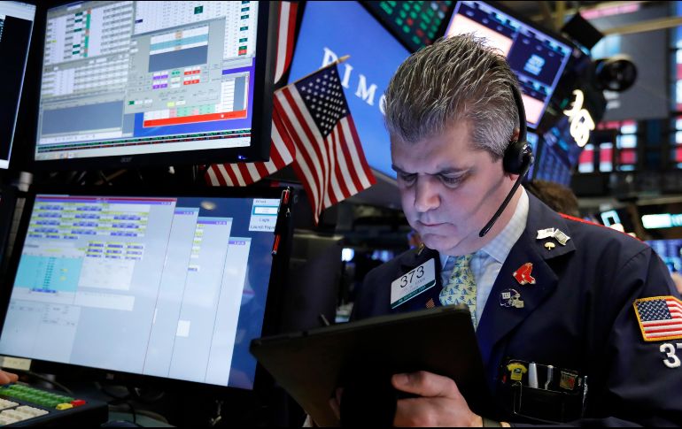 El Dow Jones cayó 133.17 unidades y llegó a 25 mil 673.46 unidades. AP / R. Drew