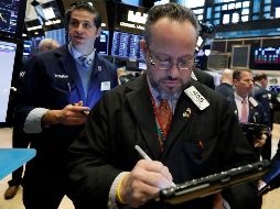 Los principales indicadores finalizaron en terreno negativo, tras una sesión influida por el anuncio del Banco Central Europeo. AP/R. Drew