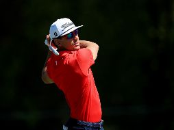 Rafa Cabrera Bello realiza uno de sus tiros en el hoyo 9 durante la primera ronda. AFP/S. Greenwood