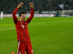 A falta de cinco minutos para el final, Robert Lewandowski selló su doblete con un certero remate de cabeza tras una linda jugada entre él y Franck Ribéry. AFP /