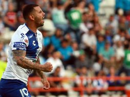 El colombiano Edwin Cardona celebra uno de sus dos goles ante Tijuana. AFP/R. Vázquez