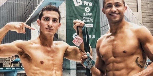 Pacheco y Ocampo, contentos con sus medallas en Serie Mundial
