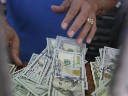 El billete verde se compró en un mínimo de 18.05 pesos. EL INFORMADOR/ARCHIVO