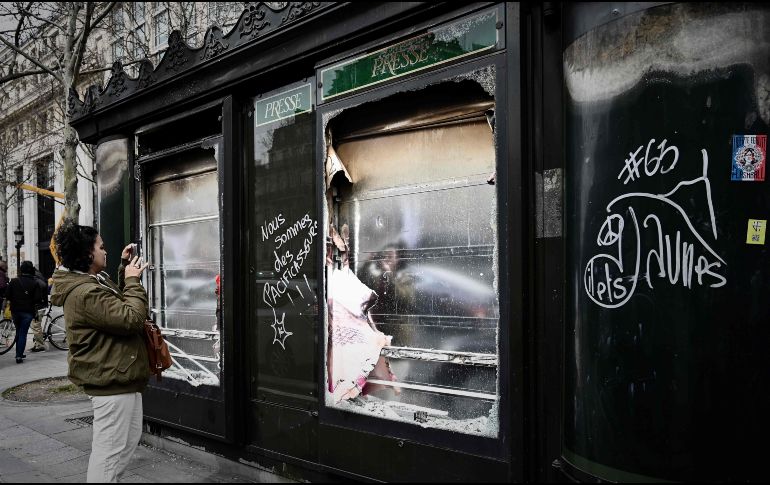 Algunas tiendas fueron saqueadas y quemadas por los manifestantes este sábado. AFP/P. Lopez