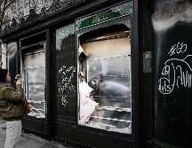 Algunas tiendas fueron saqueadas y quemadas por los manifestantes este sábado. AFP/P. Lopez