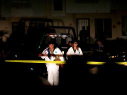 Forenses durante las  labores en el sitio del ataque en Tonalá. AFP/U. Ruiz