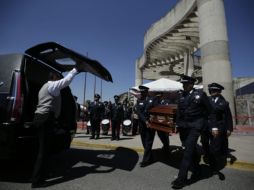 Guadalajara no solo perdió a dos más de sus elementos, los homicidas arrebataron a dos hijos, padres y hermanos. EL INFORMADOR/ F. Atilano