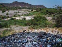 La contaminación de la cuenca del río Tehuantepec, en Oaxaca.  En 2012 se incluyó en la Constitución el derecho humano al agua. EFE/L. Villalobos
