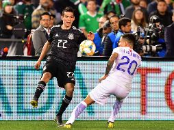 El eventual interés del PSG podría elevar considerablemente el precio de la transferencia de Lozano. AFP/F. J. Brown