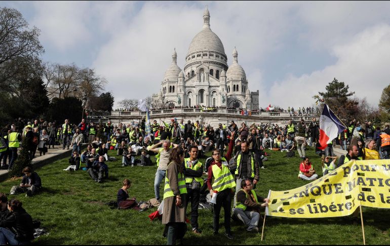 En su trayecto se escucharon consignas para exigir la renuncia del presidente Emmanuel Macron por sus políticas económicas y sociales. AFP/G. Van Der Hasselt
