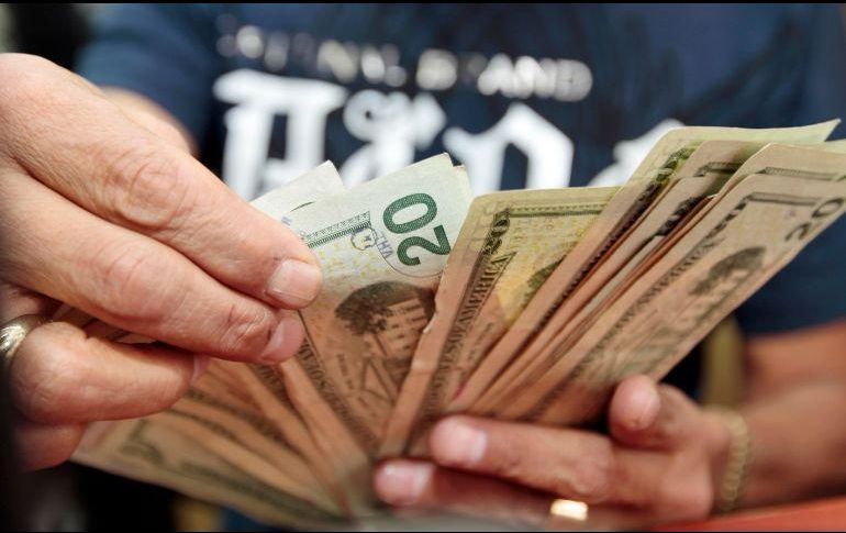 El Banco BASE prevé que el tipo de cambio cotice entre 18.90 y 19.15 pesos por dólar. EL INFORMADOR / ARCHIVO