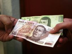 Señalan que hay todavía en México una cultura muy alta del uso del efectivo, pues el 80% y 90% de las transacciones se liquidan de esta manera. EL INFORMADOR / ARCHIVO