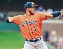 Carlos Correa presenta algunas dolencias en el cuello y se perdería el duelo de mañana. AFP