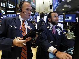 El promedio industrial Dow Jones ganó 91 unidades, para alcanzar los 25 mil 717 puntos. AP/ARCHIVO
