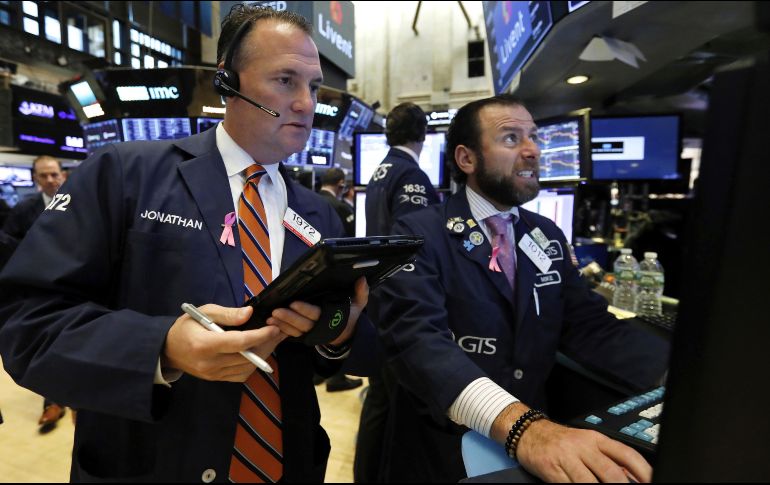 El promedio industrial Dow Jones ganó 91 unidades, para alcanzar los 25 mil 717 puntos. AP/ARCHIVO