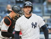 Giancarlo Stanton presenta una molestia muscular en el brazo izquierdo y estará fuera de acción por 10 días. AP