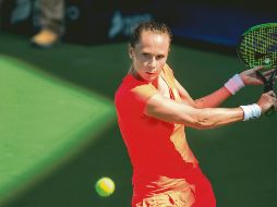 Magdalena Rybarikova regresa una bola a la suiza Stefanie Voegele. EFE