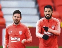 Lionel Messi y Luis Suárez serán un dolor de cabeza para la defensa del Manchester United. AFP