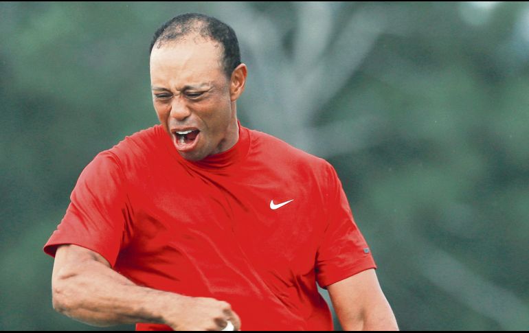 Woods celebró con euforía luego de proclamarse campeón del Masters de Augusta por quinta ocasión. AFP / M. Ehrmann