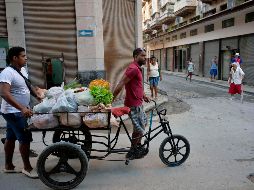 Factores como el posible efecto de la desaceleración en Estados Unidos y China, y un hipotético aumento de las tasas de interés de la Fed influyeron en la reducción del pronóstico. AFP/ARCHIVO