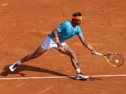 ''Es una victoria muy importante ante un muy buen adversario, que siempre es muy peligroso'', declaró Nadal, quien busca su título número 12 en el torneo. AFP / V. Hache