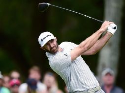 Dustin Johnson tuvo una tercera ronda de 68 golpes, tres abajo de par y llegó a un total de -10 para el campeonato. AFP/J. Tilton