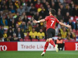 Shane Long celebra tras marcar su histórico gol tempranero. AFP