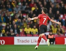 Shane Long celebra tras marcar su histórico gol tempranero. AFP