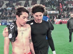 Govea y Ochoa dialogan tras el partido que ganó el Antwerp. @StandardLiegeES