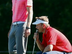Los estadounidenses Billy Hurley III  (derecha) y Peter Malnati lograron concluir la segunda ronda. AFP