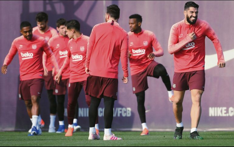 Las sonrisas abundan con el campeón de España en la víspera del duelo de Champions League. AFP