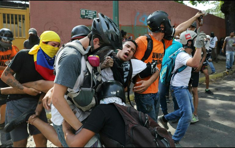 Ambas naciones buscan que haya una solución pacífica en Venezuela. AP / R. Abd