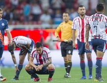 Pérez (en cuclillas) lamenta que las lesiones hayan afectado su rendimiento. MEXSPORT/ARCHIVO