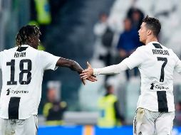 Moise Kean y Cristiano Ronaldo celebran después de la anotación del portugués. AP/A. Di Marco