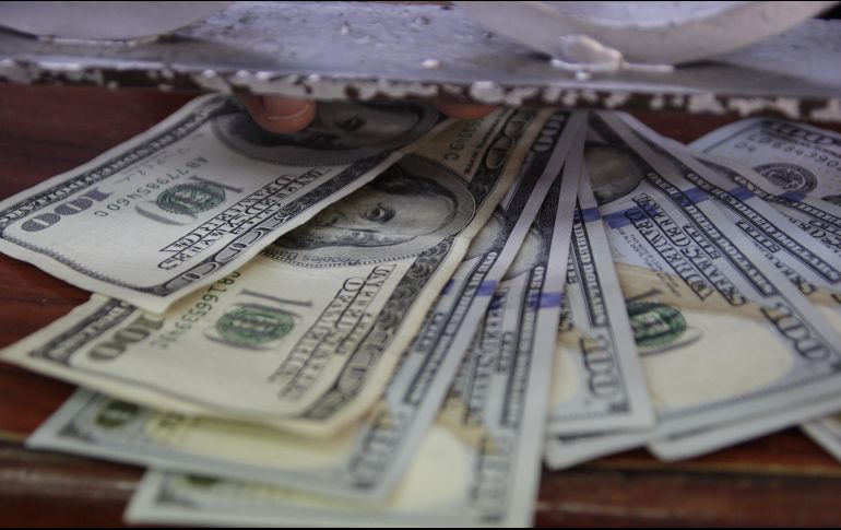 El tipo de cambio para solventar operaciones denominadas en moneda extranjera pagaderas en el país se ubica en 19.0837 pesos. EL INFORMADOR / ARCHIVO