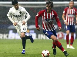 Se rumorea que los hechos del cierre de temporada hicieron al jugador francés replantearse las cosas en el Atlético. ARCHIVO / EFE