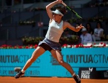 En la primera manga, la rumana apenas tuvo problemas para imponerse con tres roturas que le dieron el set. AP / B. Armangue