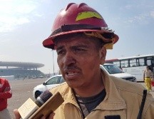 Tras horas de combate al fuego, Servicios Médicos mandó a descansar a Marco Antonio por presentar un cuadro de fatiga. EL INFORMADOR / S. Blanco