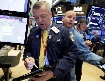El Dow Jones avanzó 197 puntos, un 0.8 por ciento, hasta alcanzar las 25 mil 877 unidades. AP/ARCHIVO